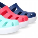 Kids jelly shoes with OLA CLOG design for beach and pool use.