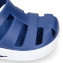 Kids jelly shoes with OLA CLOG design for beach and pool use.