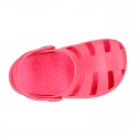 Kids jelly shoes with OLA CLOG design for beach and pool use.