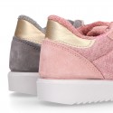 Knit cotton canvas Girl sneaker shoes combined with suede leather with ties closure.