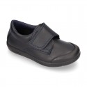 Kids OKAA School shoes closed with laceless and reinforced toe cap in washable leather.