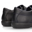 Kids OKAA School shoes closed with laceless and reinforced toe cap in washable leather.