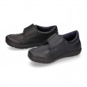 Kids OKAA School shoes closed with laceless and reinforced toe cap in washable leather.