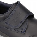 Kids OKAA School shoes closed with laceless and reinforced toe cap in washable leather.