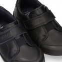 Kids OKAA School shoes closed with laceless, elastic band and reinforced toe cap in washable leather.