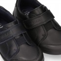 Zapato colegial niño OKAA sin cordones, elástico y puntera reforzada en piel lavable.