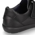 Zapato colegial niño OKAA sin cordones, elástico y puntera reforzada en piel lavable.