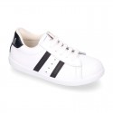 Washable leather OKAA kids School tennis shoes with laces, stripes design and toe cap.