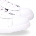 Washable leather OKAA kids School tennis shoes with laces, stripes design and toe cap.