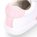 Washable leather OKAA kids School tennis shoes with laces, stripes design and toe cap.