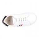 Washable leather OKAA kids School tennis shoes with laces and flag design.