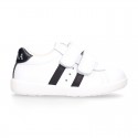 Washable leather OKAA kids School tennis shoes laceless, stripes design and reinforced toe cap.