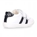 Washable leather OKAA kids School tennis shoes laceless, stripes design and reinforced toe cap.