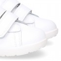 Washable leather OKAA kids School tennis shoes laceless, stripes design and reinforced toe cap.