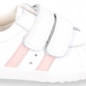 Washable leather OKAA kids School tennis shoes laceless, stripes design and reinforced toe cap.