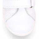 Washable leather OKAA kids School tennis shoes laceless, stripes design and reinforced toe cap.