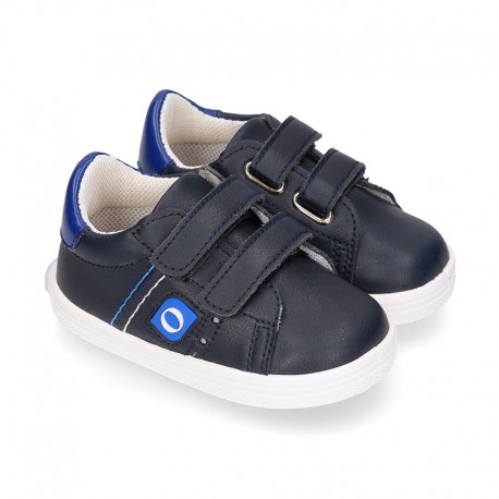 Navy blue color OKAA FLEX tennis kids shoes laceless.