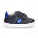 Navy blue color OKAA FLEX tennis kids shoes laceless.