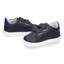 Navy blue color OKAA FLEX tennis kids shoes laceless.