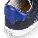 Navy blue color OKAA FLEX tennis kids shoes laceless.