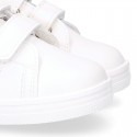 White color OKAA FLEX tennis kids shoes laceless.