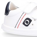 White color OKAA FLEX tennis kids shoes laceless.