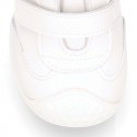 White color OKAA FLEX tennis kids shoes laceless and with toe cap.