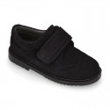 Suede leather kids School shoes Blucher style laceless with chopped design.