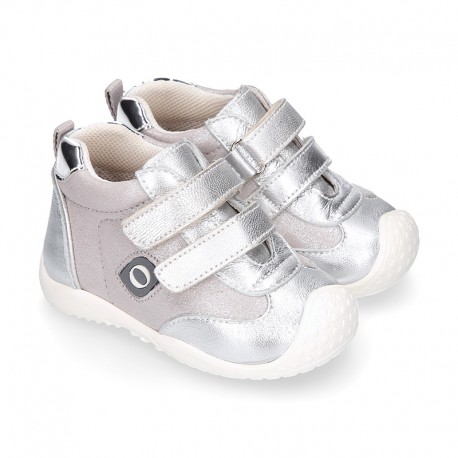 Silver color OKAA FLEX tennis girl shoes laceless and with toe cap.