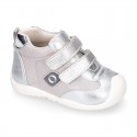 Silver color OKAA FLEX tennis girl shoes laceless and with toe cap.
