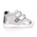 Silver color OKAA FLEX tennis girl shoes laceless and with toe cap.