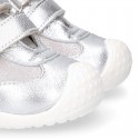 Silver color OKAA FLEX tennis girl shoes laceless and with toe cap.