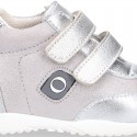 Silver color OKAA FLEX tennis girl shoes laceless and with toe cap.