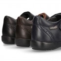 Perforated Girl Mary Jane School shoes with hook and loop strap in PREMIUM leather.