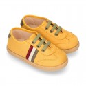 Trendy colors autumn winter canvas kids tennis shoes with flag design.