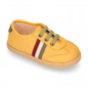 Trendy colors autumn winter canvas kids tennis shoes with flag design.