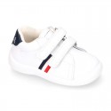 Washable leather OKAA Little kids School tennis shoes laceless and with side flag design.