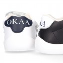 Washable leather OKAA Little kids School tennis shoes laceless and with side flag design.