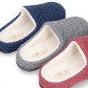 Square design wool knit kids home shoes with opened shape.