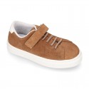 SUEDE LEATHER OKAA kids tennis shoes with elastic laces and hook and loop strap.