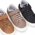 SUEDE LEATHER OKAA kids tennis shoes with elastic laces and hook and loop strap.