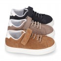 SUEDE LEATHER OKAA kids tennis shoes with elastic laces and hook and loop strap.