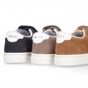 SUEDE LEATHER OKAA kids tennis shoes with elastic laces and hook and loop strap.