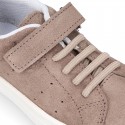 SUEDE LEATHER OKAA kids tennis shoes with elastic laces and hook and loop strap.