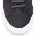 SUEDE LEATHER OKAA kids tennis shoes with elastic laces and hook and loop strap.
