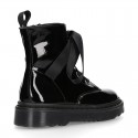 ROCK style patent finish girl boots with silk ties closure.