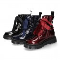 ROCK style patent finish girl boots with silk ties closure.