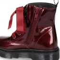 ROCK style patent finish girl boots with silk ties closure.