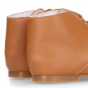 TAN color Nappa Leather kids booties with laces closure.