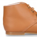 TAN color Nappa Leather kids booties with laces closure.